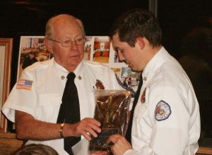 DILLON COUNTY STATION NINE (OAK GROVE) FIRE DEPARTMENT FIRST RESPONDER OF THE YEAR - Chief Terry Weichel presented the First Responder of the Year award for 2016 to Nick Rogers. (Photo by Betsy Finklea/The Dillon Herald)
