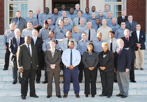 THE DILLON COUNTY SHERIFF’S OFFICE—Front Row: Chief Deputy Larry Abraham, Sgt. Allan Rogers, Sgt. Reggie Thompson, Angela Thompson, Officer Brenda Campbell, Sheriff Major Hulon; 2nd Row: Reserve Mitchell Gardner, Sgt. Shannon Grainger, 1st Sgt. Phillip Davis, Ofc. Don Lewis, Ofc. Trenton Taylor, Sgt. Steve Bethea, Ofc. Johnnie Mae Smith, Sgt. Tim George; 3rd Row: Ofc. Louis Barfield, Pfc. Richard Lee, Ofc. Tisha Billings, 1st Sgt. Michael Barfield, Pfc. Kimberly Brumble, Officer DeWitt M. Coleman, Roderick “Birdman” Miller, Pvt. Andrew Miller, Chaplain Haywood Proctor; 4th Row: 1st Sgt. Robert Bucy, Ofc. John Thompson, Pvt. Russell Hubbard Jr., 1st Sgt. Chaddie Hayes, Ofc. Kernard McLellan, 1st Sgt. Marion Ford, Sgt. Wayne Kirby; 5th Row: Pvt. Arthur Quick, Ofc. Patrick Legette, 1st Sgt. Ricky Day, 1st Sgt. Glenn Coates, Ofc. Scott Barfield, Cpl. Gary Cook, Captain Cliff Arnette; 6th Row: Ofc. Bobby Powers, Ofc. Kenneth Samuel, Sgt. Troy Jones, Cpl. Robert Porter, Ofc. James McDaniels; Back Row: Ofc. James McAllister, Ofc. Tracy Pelt Jr., Ofc. Wayne Green, Ofc. Jamie Hamilton. (Photo by Johnnie Daniels/The Dillon Herald)